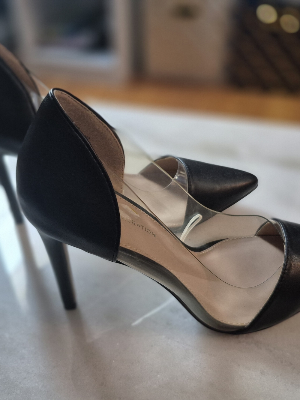 BCBGeneration Black Pointed Toe Pumps with Clear Panels